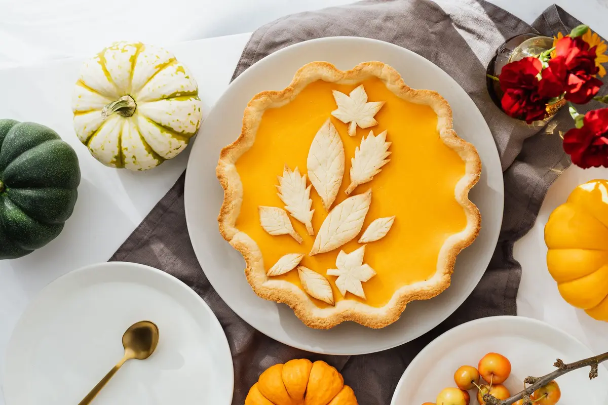 pumpkin pie with leaf pastry decoration, corny thanksgiving jokes