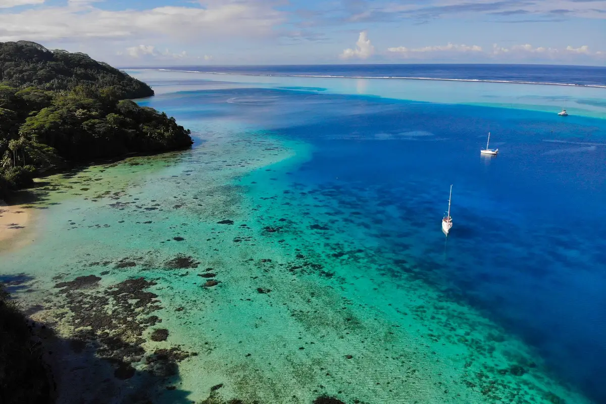 aerial view of a Pacific island lagoon, world flight jokes about Howland Island