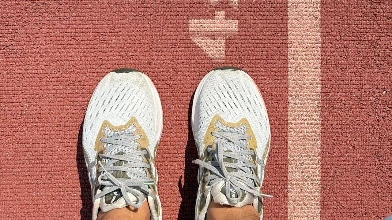 a runner standing on the 400 meter line of a red running track, image for track and field knock knock jokes