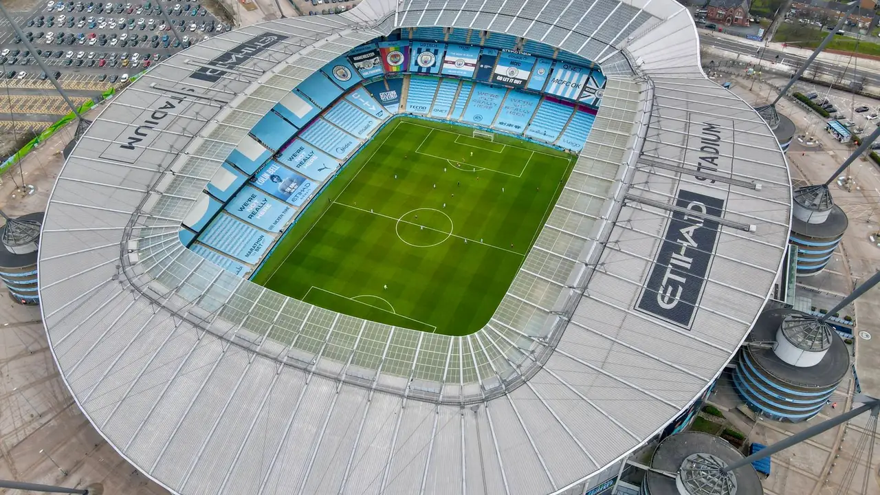 a football stadium seen from above, image for man city jokes about nicknames and the team sheet