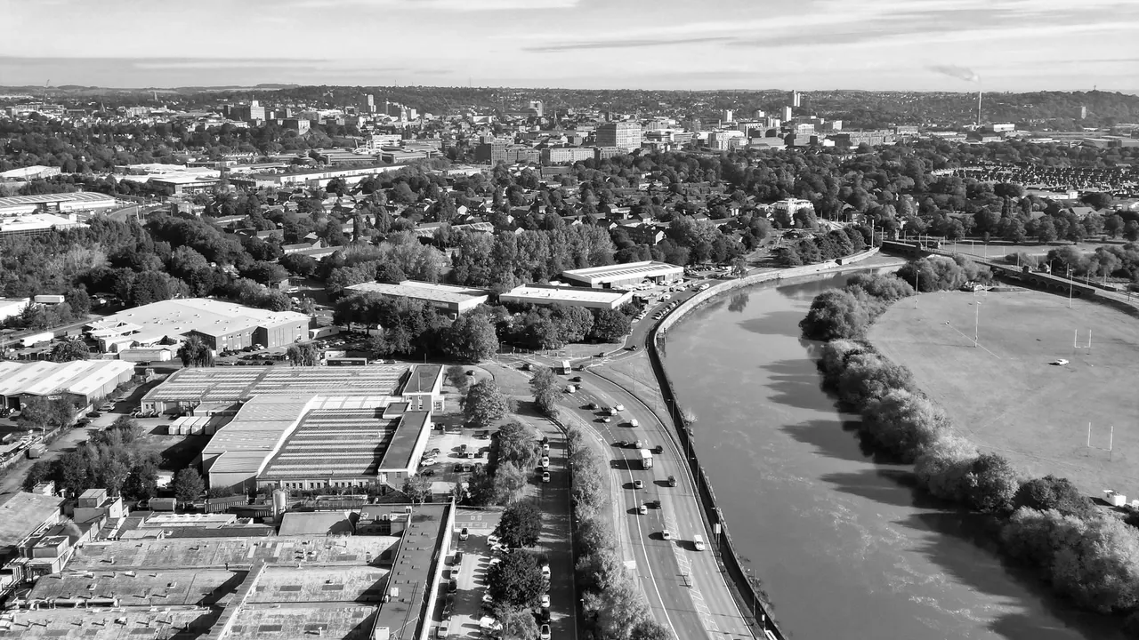 an aerial view of nottingham with the river trent winding past the city, image for nottingham forest jokes about the city ground
