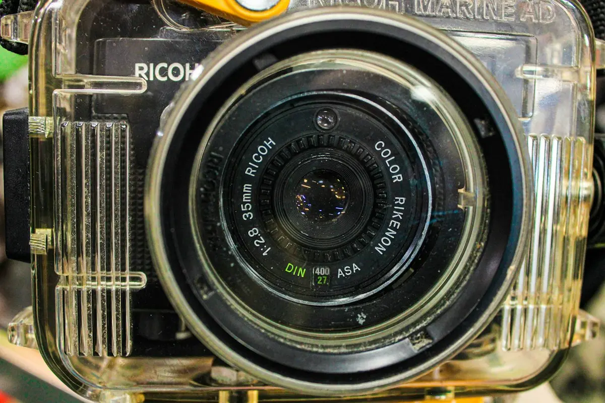 a close-up of a camera lens on a table, image for lens and camera puns