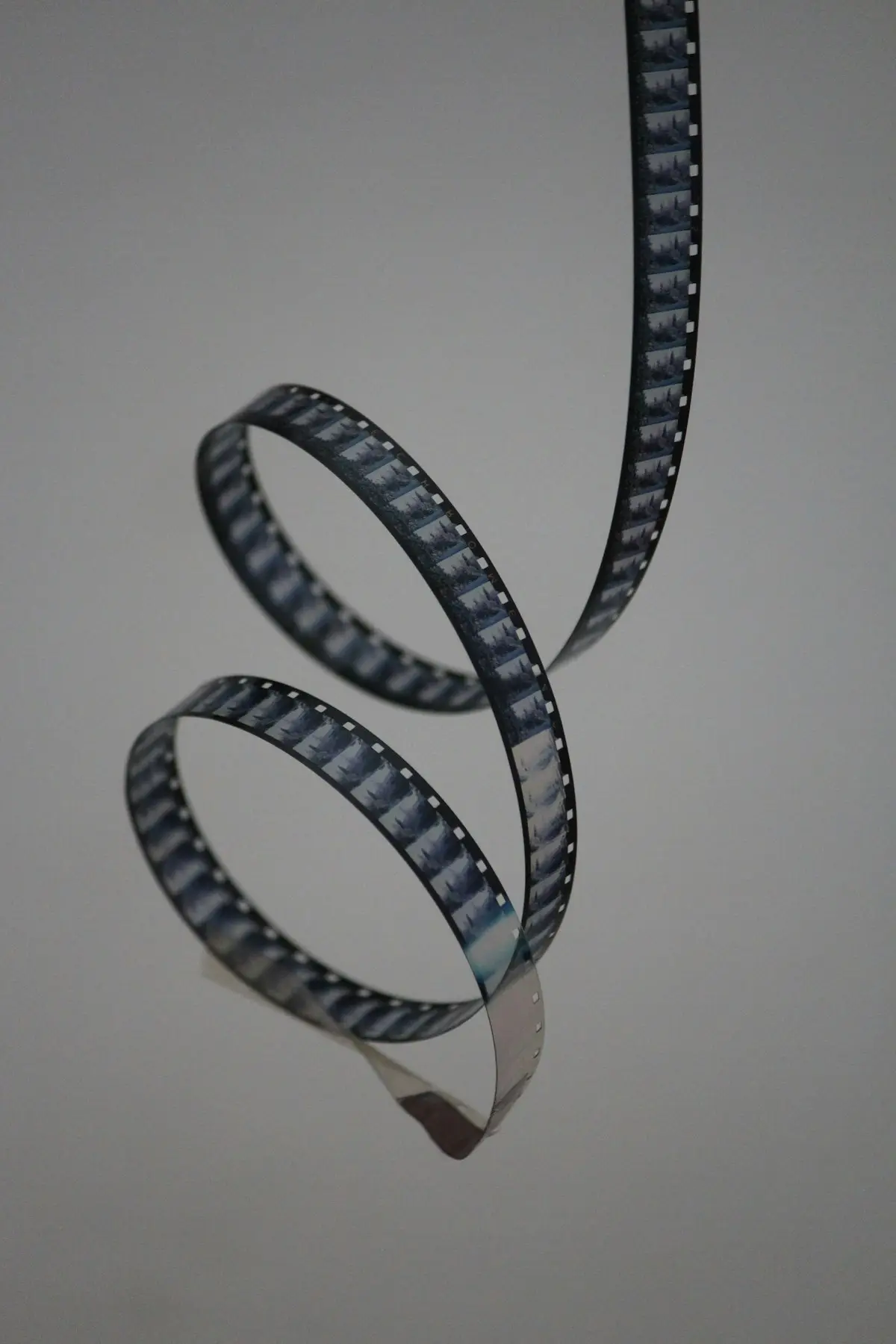 a close-up of a camera film reel, image for photography trivia and camera puns