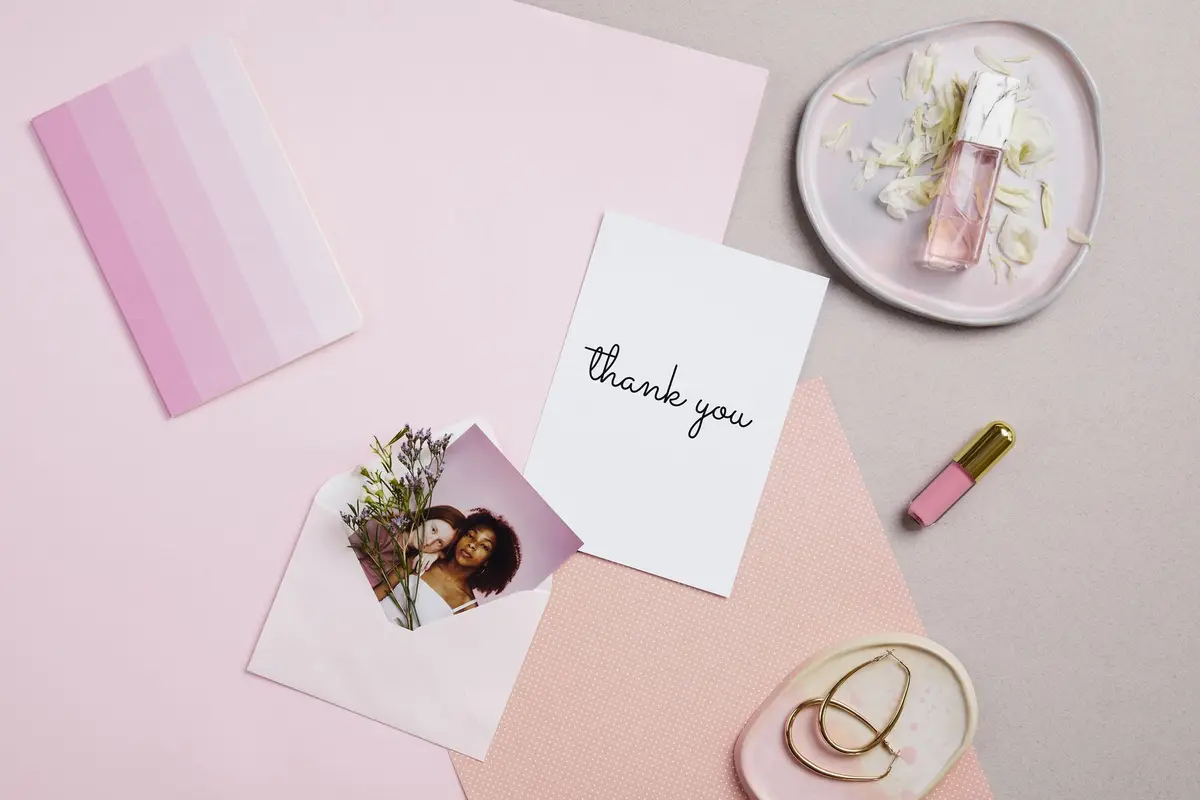 thank you card and flowers on a pastel table, cute sayings and thank you lines for teachers